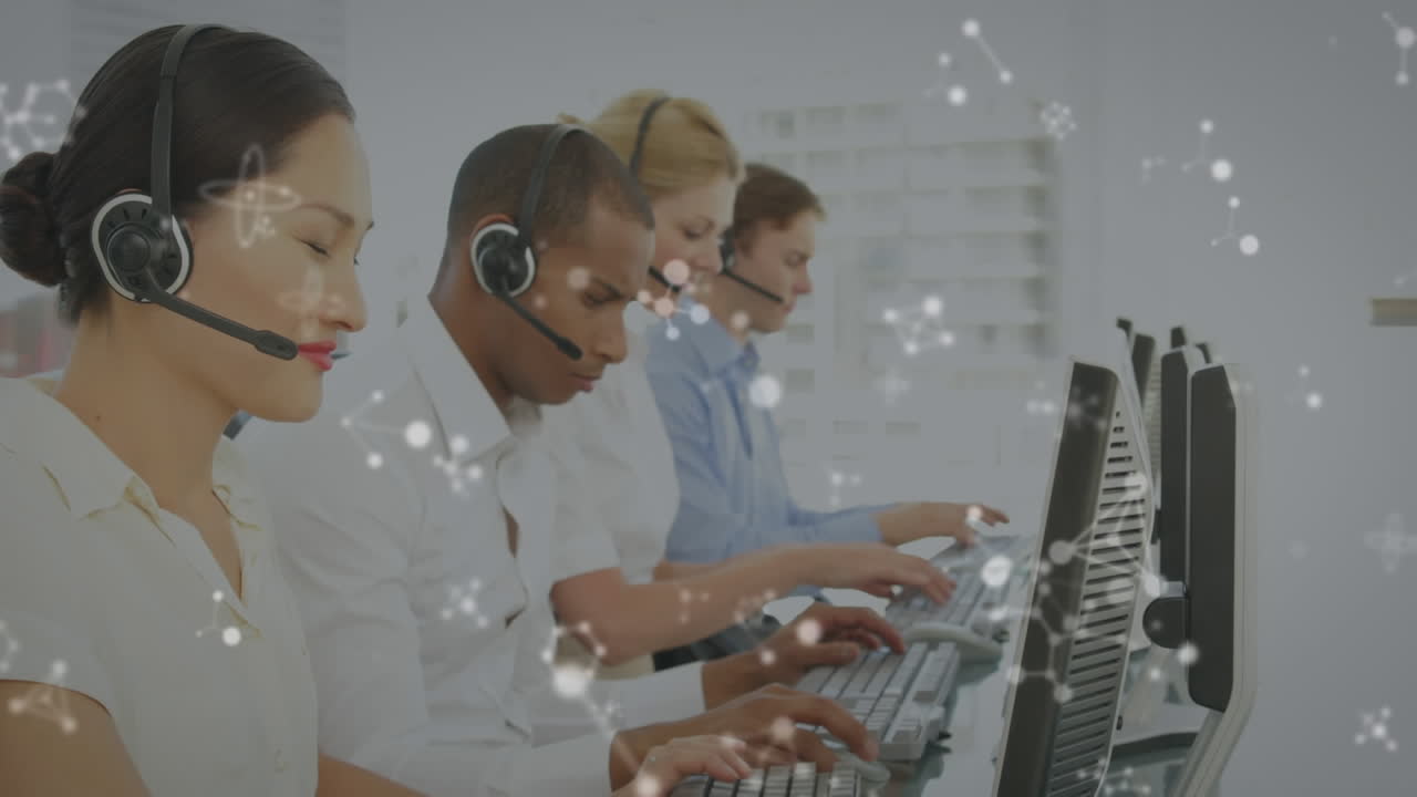Animation of moving molecules over business people wearing phone headsets