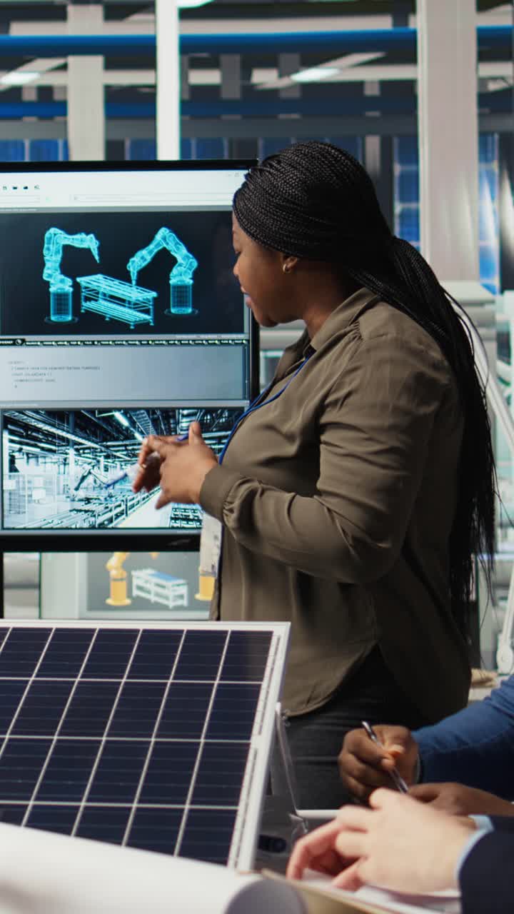 Vertical video Factory research and development division scientists test solar panels materials