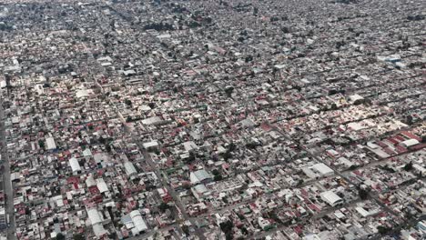 aerial drone view of ecatepec, mexico's dense urban landscape