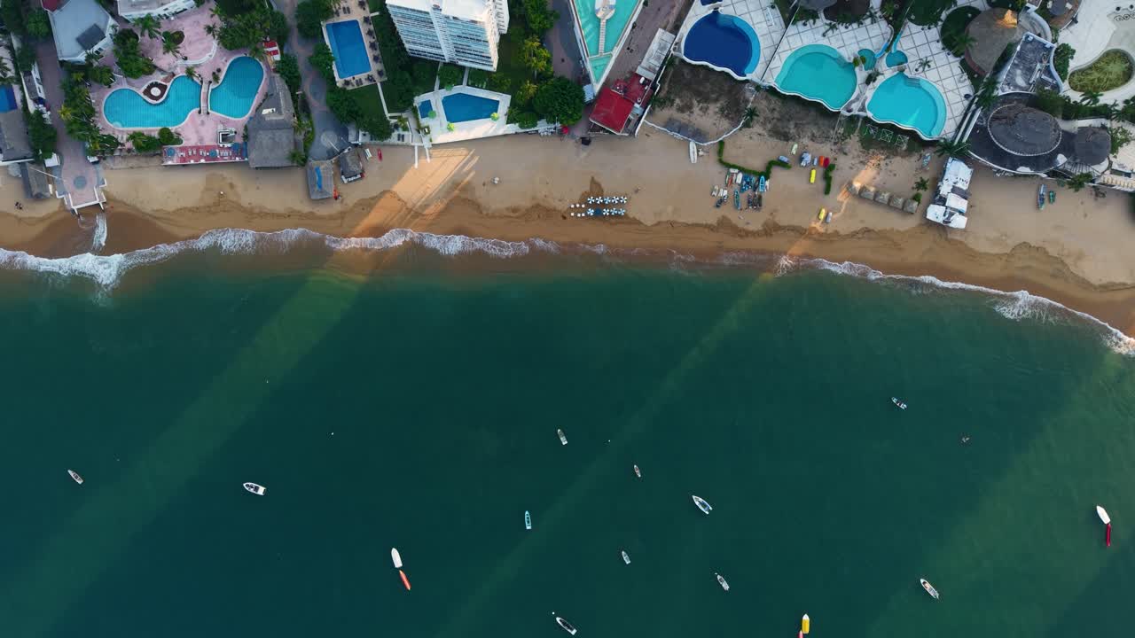 Aerial video of a turquoise-colored beach in Acapulco’s coastal area, Mexico