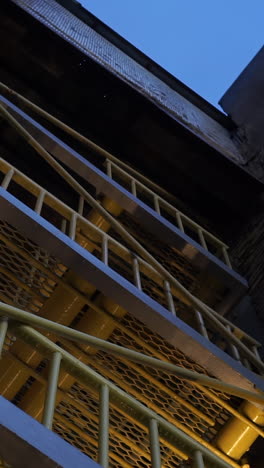 fire escape on a building at night