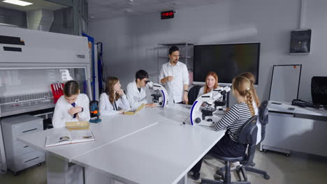 students learn biology in a science lab