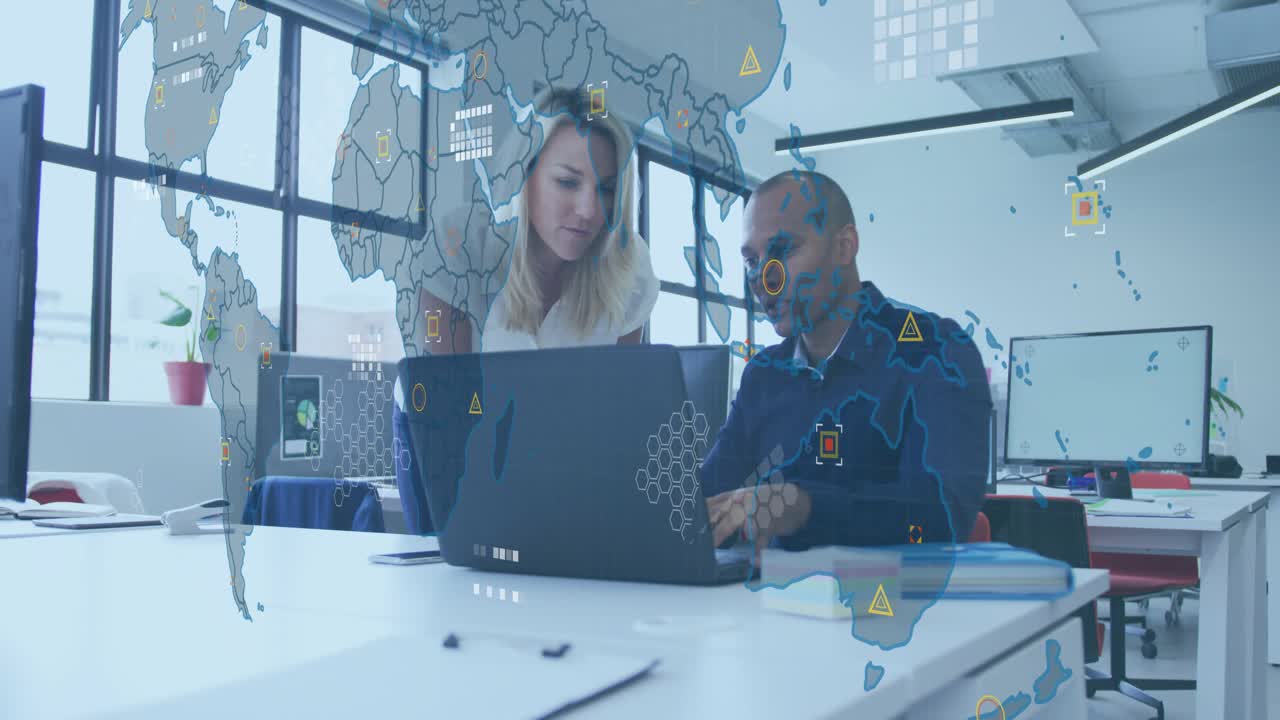 Woman leaning while man gesturing and typing, causing UI map overlay to expand, supporting business