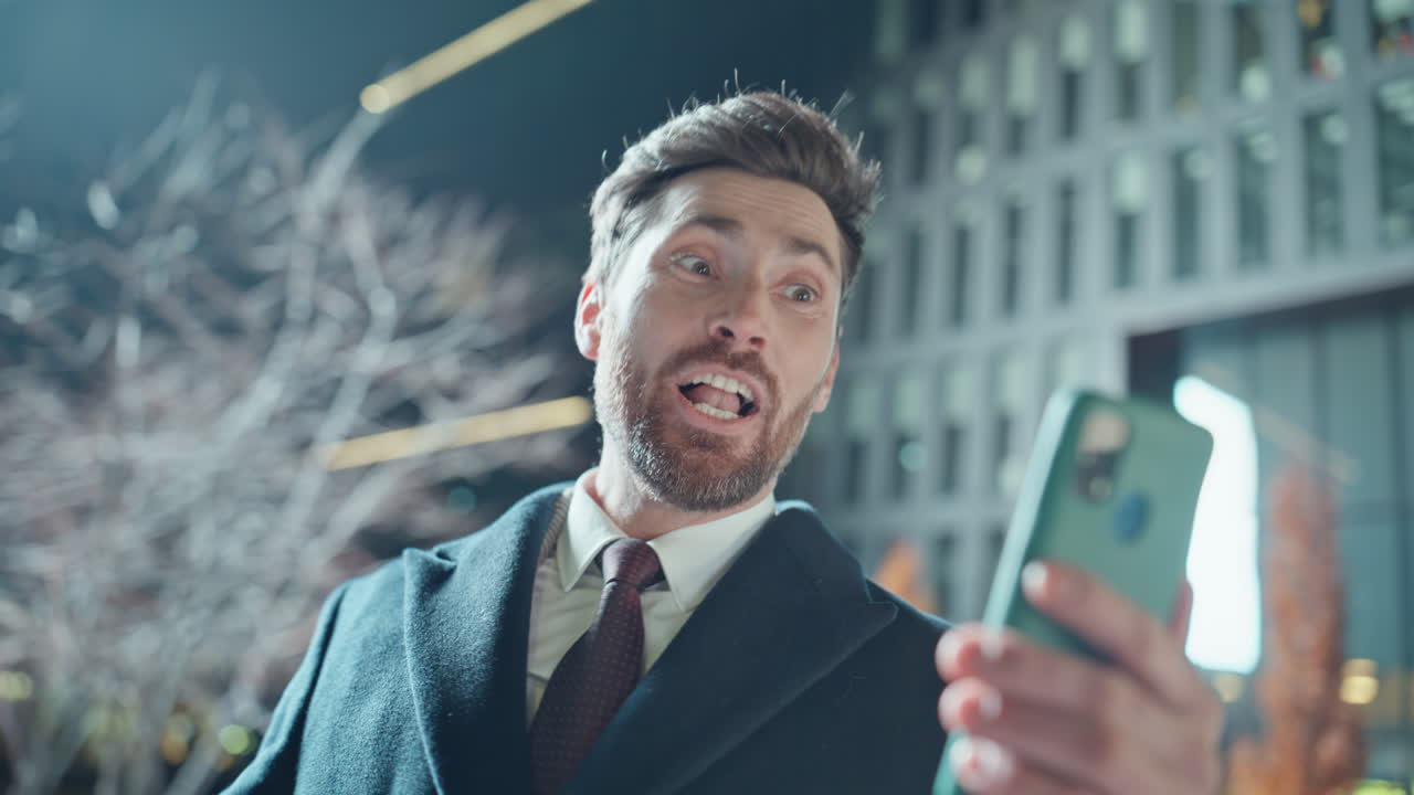 Funny boss online conversation at dark neighbourhood portrait. Man talking call