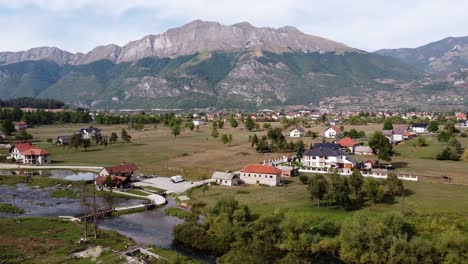 gusinje valley and ali pasha springs near prokletije national park, montenegro - aerial circling pan