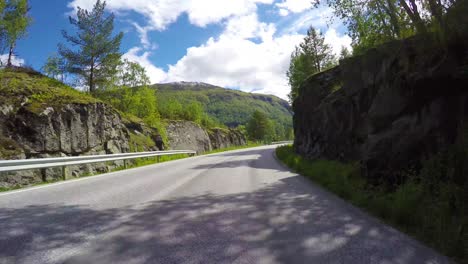 driving a car on a road in norway