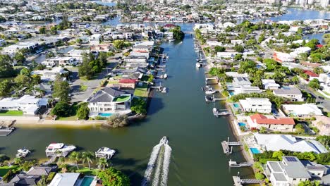 drone captures boats navigating scenic waterways