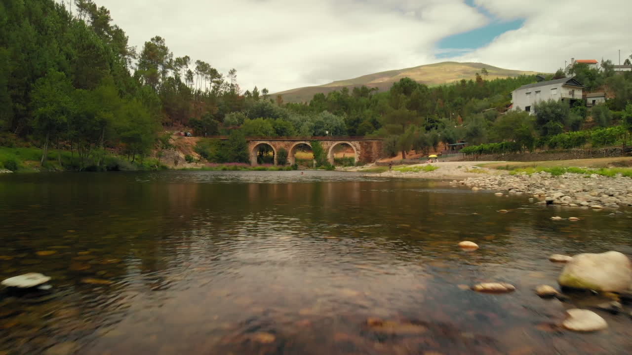 Girl in the River in a Summer Day
