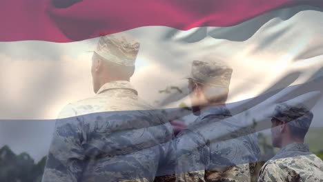 animación de la bandera de los países bajos sobre varios soldados varones