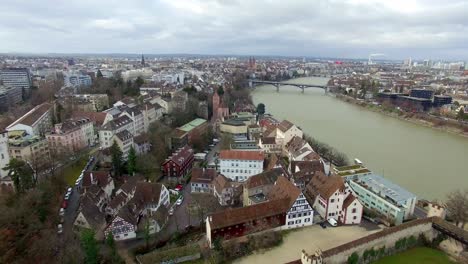 Elevate your perspective with an aerial view of Basel, tracing the Rhine&#039;s charming housing borders