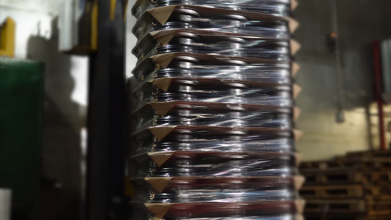 Stacked Metal Parts on a Pallet in a Warehouse