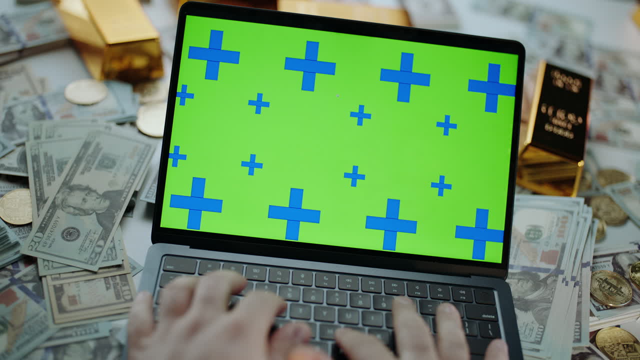 Laptop with Money and Gold