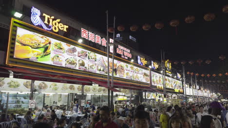 jalan alor food street during typical night. kuala lumpur, malaysia. top tourist destination