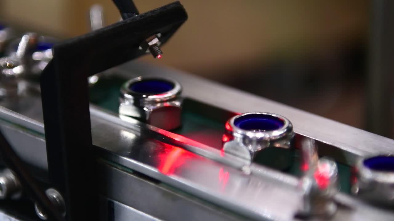 Automatic vision system for inspection nuts in product line