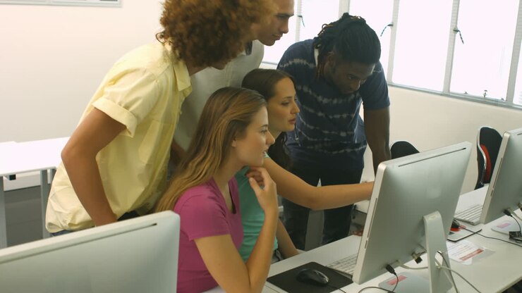 Students using computer in classrooms