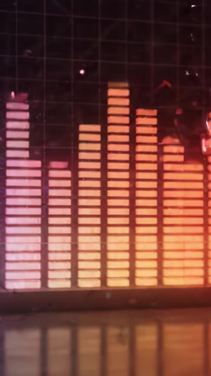Visual Representation of Sound Waves with a Colorful Audio Equalizer Displaying Frequency Levels and Intensity in a Dynamic Spectral Format