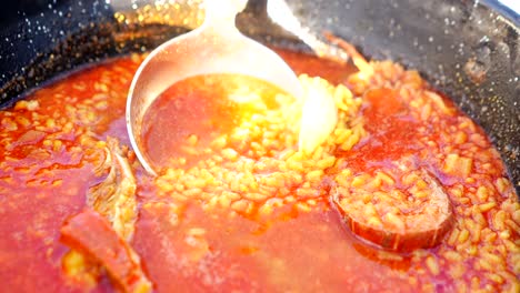sopa de arroz de mariscos con langosta