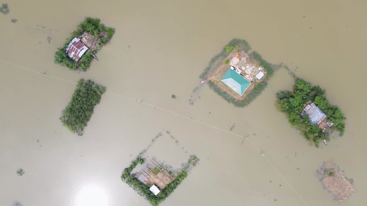 A View Of A Village With Floating Houses After A Storm In Bangladesh, South Asia. Aerial Topdown Shot
