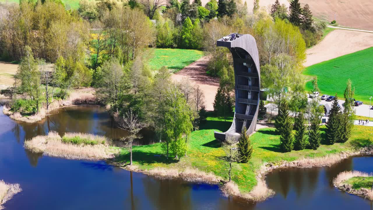 Kirkilai Observation Tower Over Pristine Natural Expanse Of Birzai Regional Park In Lithuania. Aerial Drone Shot