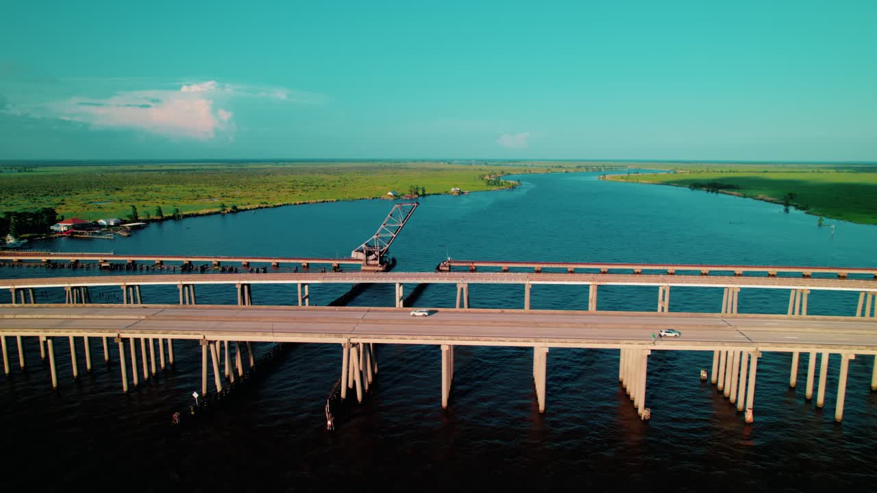 Aerial view of Manchac Swamp Bridge and drawbridge section over Louisiana wetlands