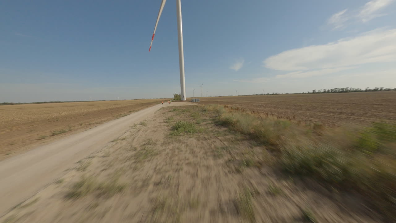 Wind Farm Construction Site with Workers