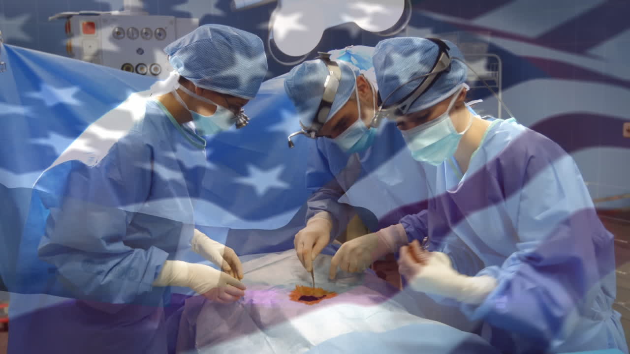 Animation of flag of united states of america waving over surgeons in operating theatre