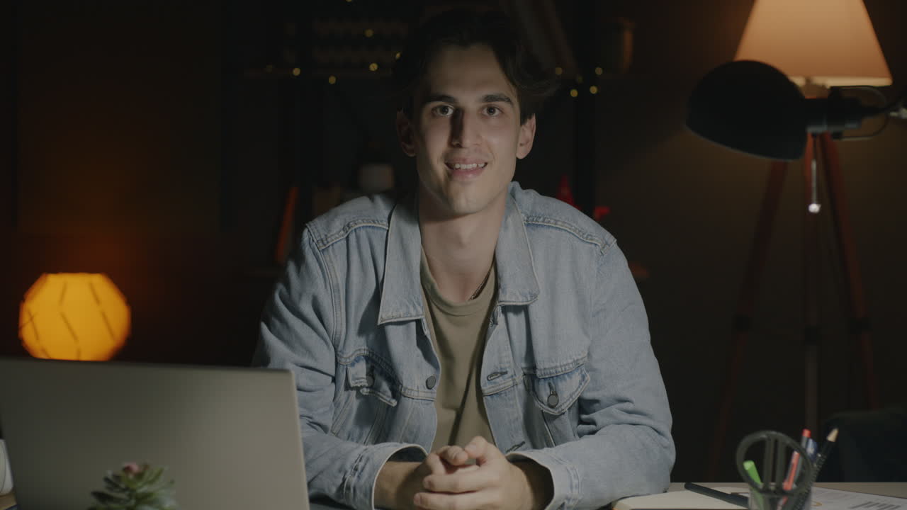 Young Man Working Late at Night