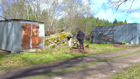 fast moving footage of man and female rake up dried leaves during sunny spring. time lapse of cleaning up yard lawn, pile of dry leaves is growing. timelapse of couple raking in the countryside garden