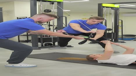 physical therapy session with cable machine