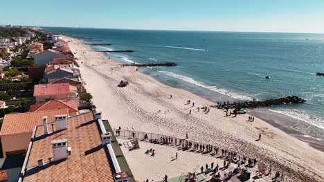 aerial view of palavas-les-flots with feria crowds on the beach