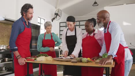 Köche-Kochen-Gemeinsam-Einen-Fisch