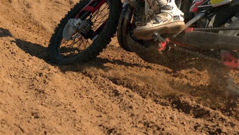 man riding a motor cross bike