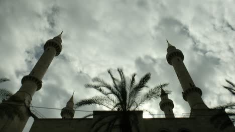 fast motion mosque and clouds