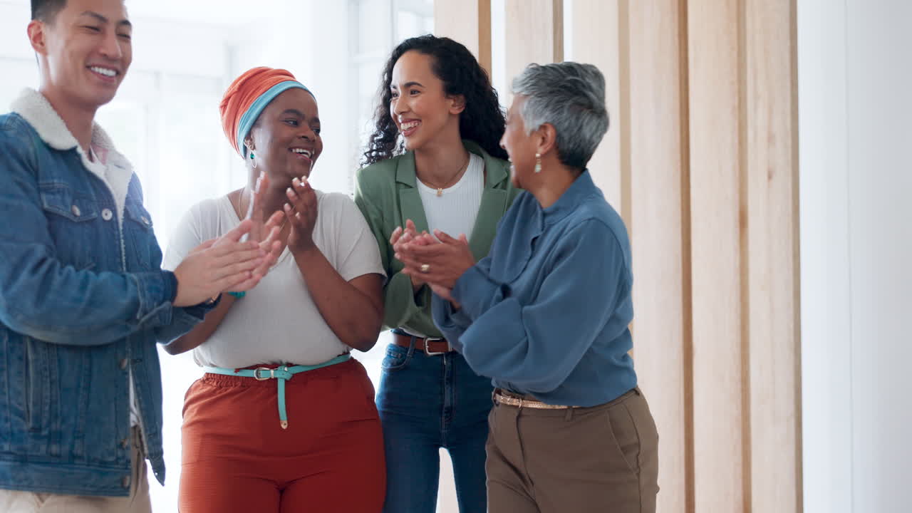 Diverse Team Celebrates Success with Applause