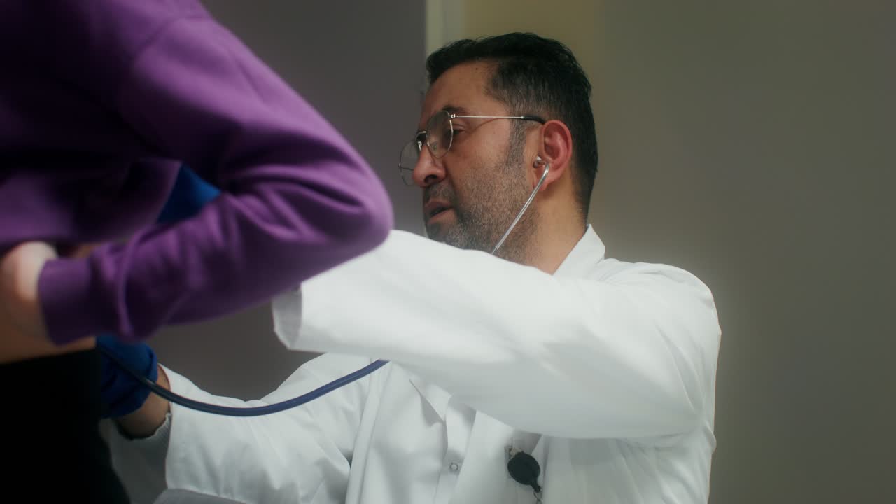 Doctor examining a child