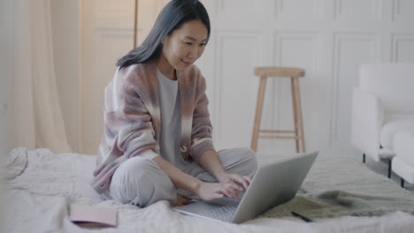 woman working from home on laptop