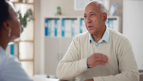 elderly man consulting with doctor about neck pain