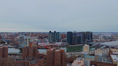 Wide-shot-of-residential-area,-high-buildings,-New-York-City,-drone