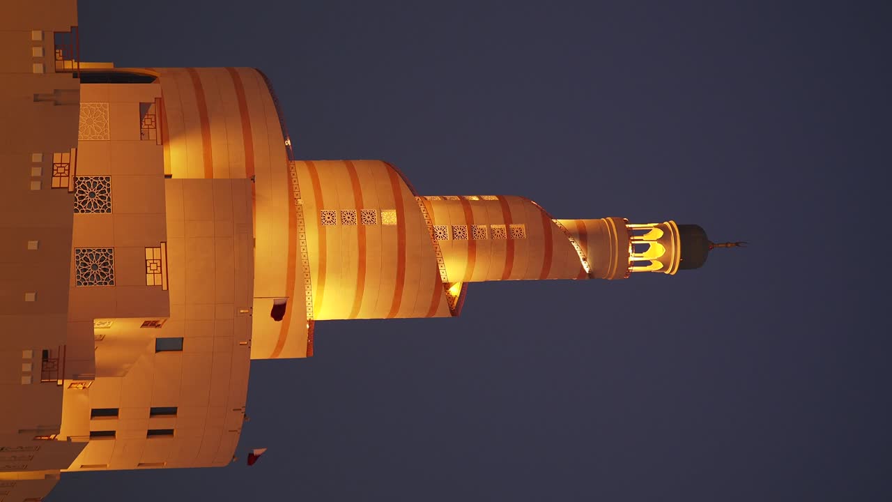 The Iconic Spiral Mosque (Fanar) in Doha, Qatar, Illuminated at Night