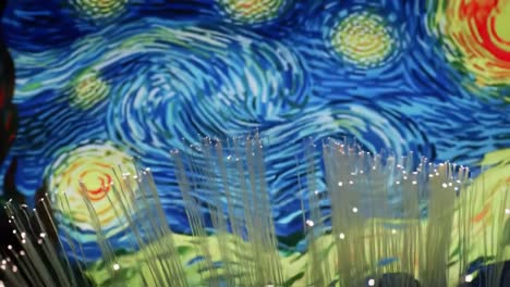 immerse yourself in a stunning indoor exhibition featuring a light display that draws inspiration from a well-known painting.