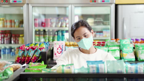 Young-Brunette-Woman-Wearing-Mask-Inside-The-Supermarket