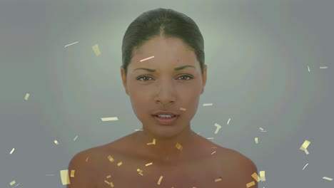 animation of confetti over biracial woman sneezing