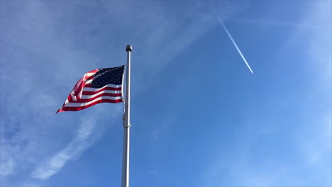 the american flag moving along with the wind in slow motion