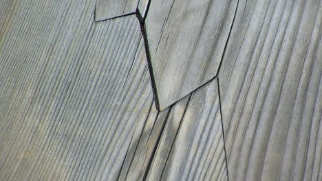 close-up detail of an intricate repair of damaged wood done in the traditional japanese style