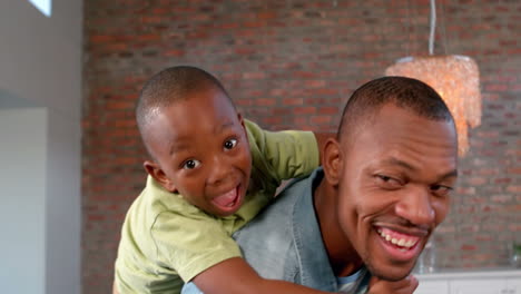 Father-and-son-having-fun-at-home