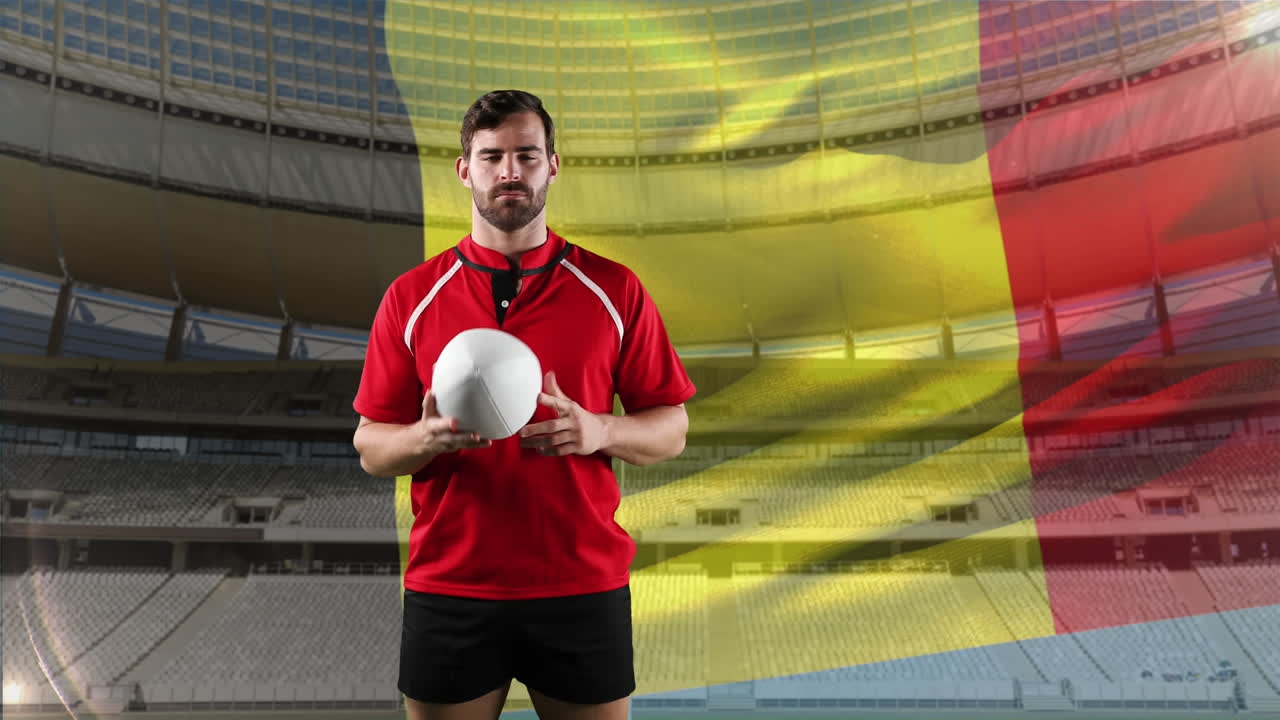 jugador de rugby profesional de pie frente a una bandera y un estadio