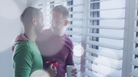 animación de manchas de luz sobre diversas parejas masculinas abrazándose.