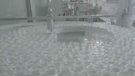 inside industrial pharmaceutical factory, a skilled workforce of scientists, technicians collaborates to oversee, maintain automated production lines. clean, sterile, efficient manufacturing process.