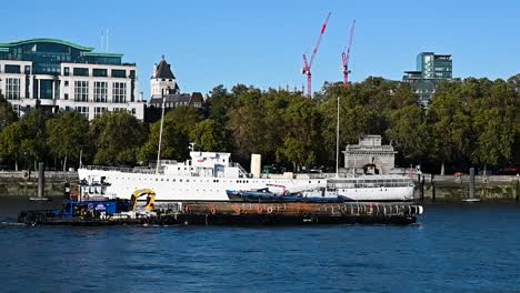 materials being removed from the thames, london, united kingdom