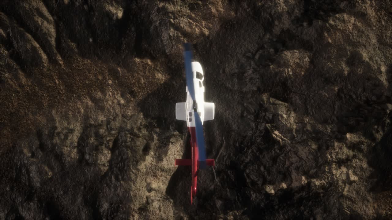 helicóptero en cámara lenta sobre el desierto rocoso